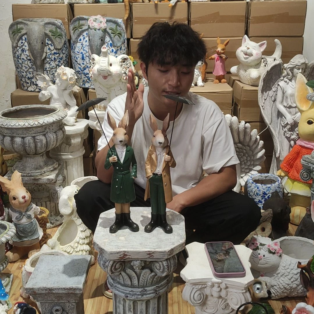 合成树脂打伞兔一对