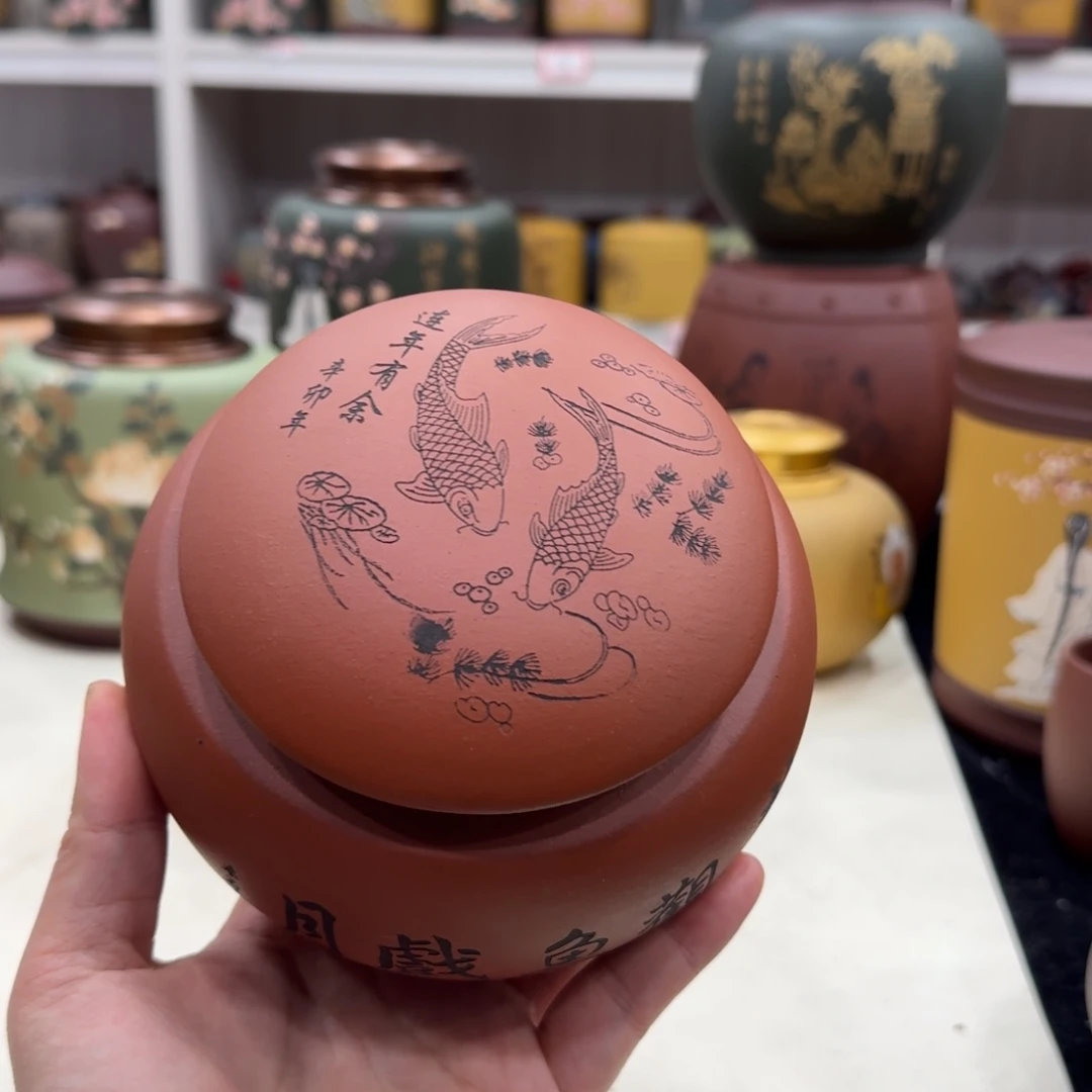 紫砂茶叶罐红年年有余