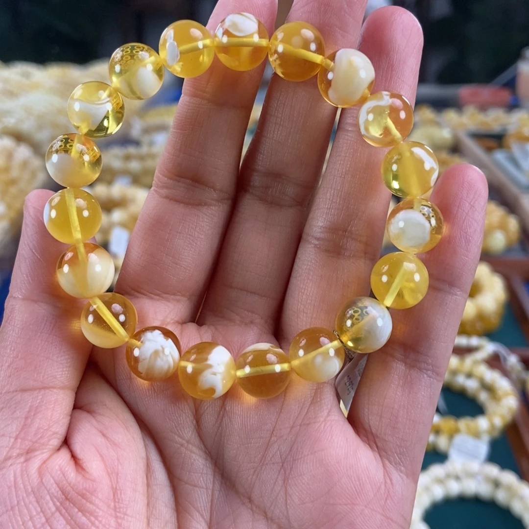 琥珀未镶嵌珠宝奇石10+金白妖花圆珠12.92