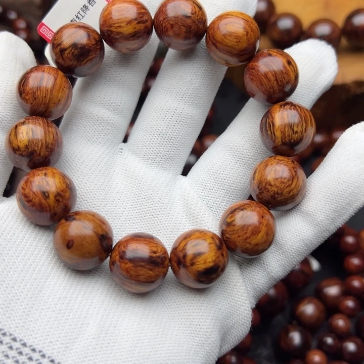 木洋****动海南红降1.6黄油芝麻纹一档精品圆珠