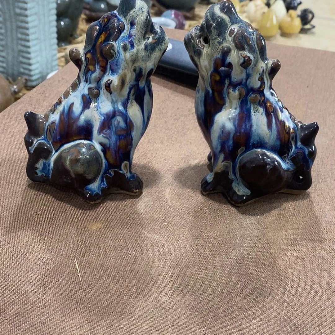 黑唐钧的一对狮子