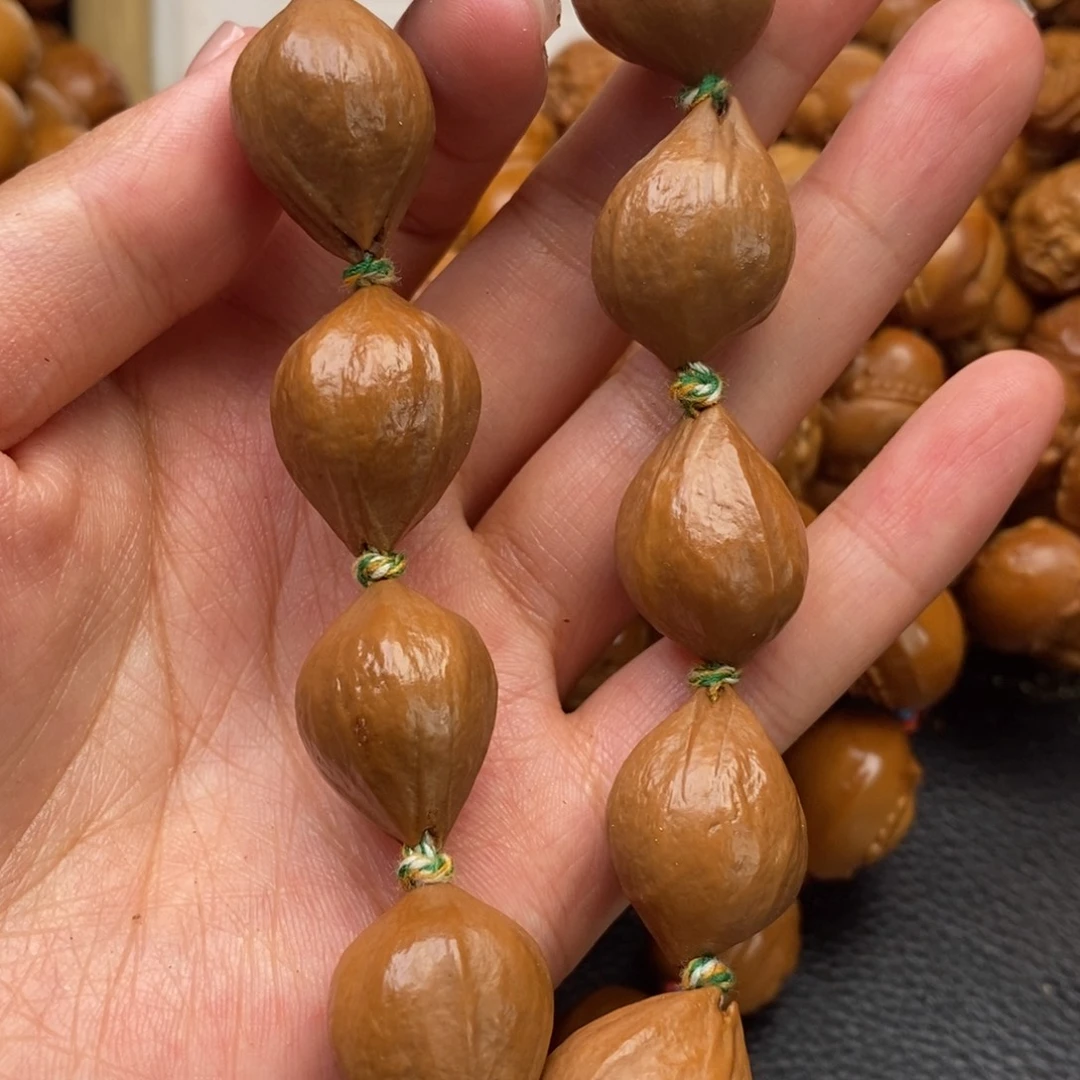 橄榄核吊坠素核手串