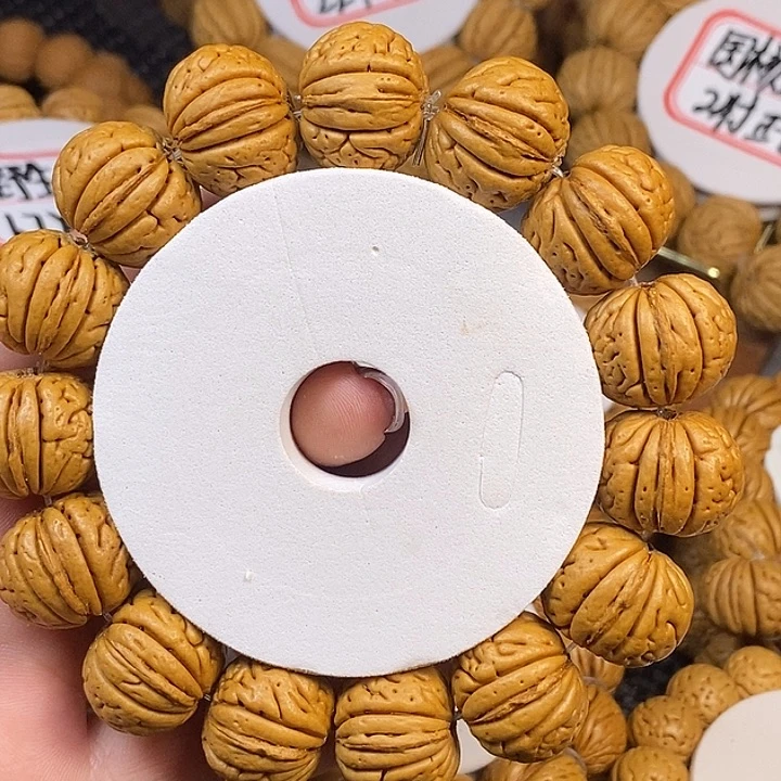 牛****手串桃核金鱼肚2.0/21