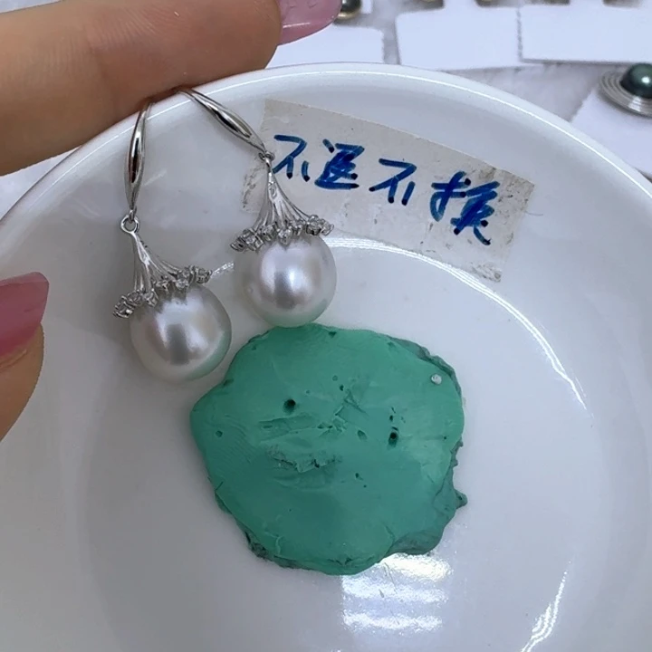 银S925镶嵌海水珍珠耳饰木*?有瑕处理