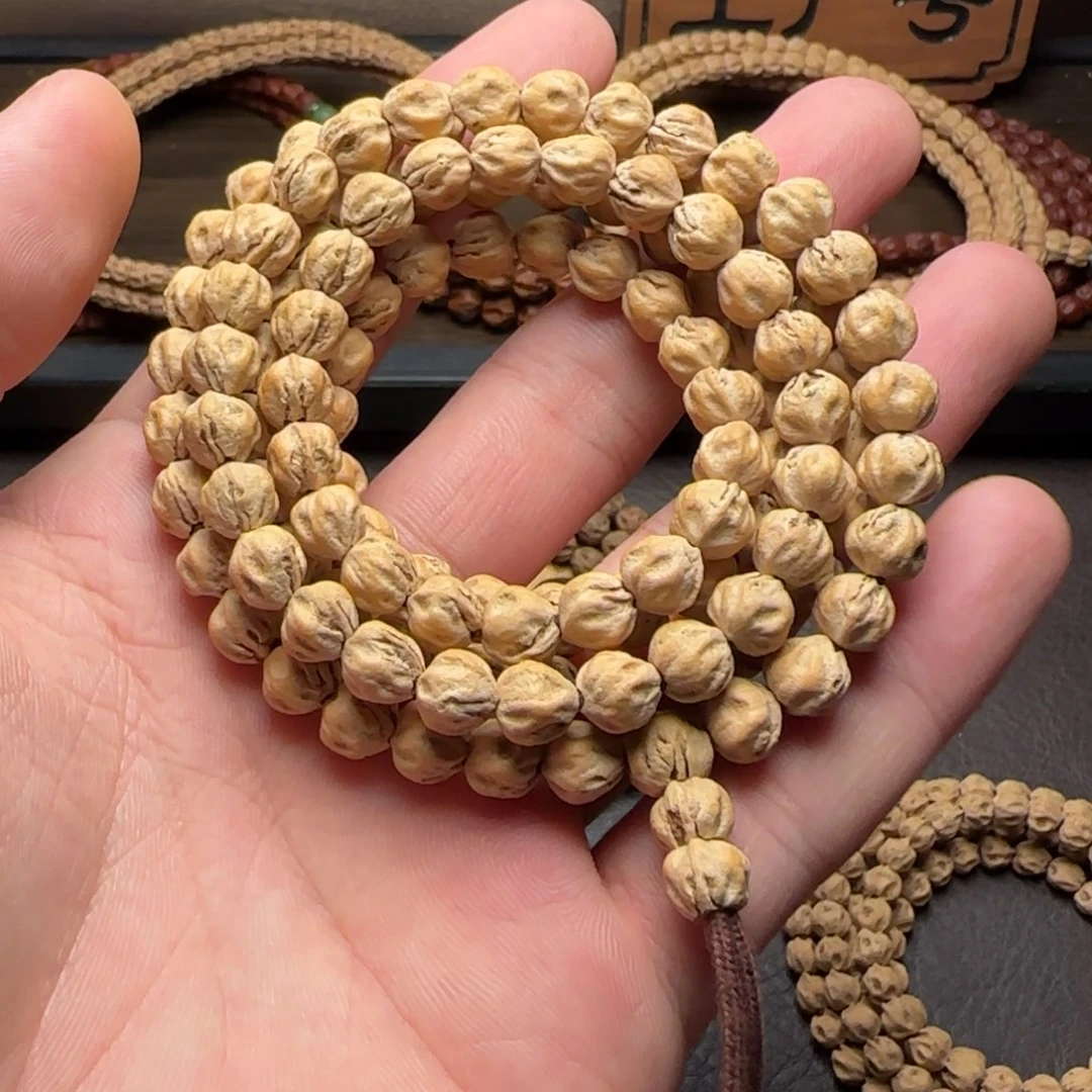 哈***哈柏香籽/百香籽吊坠