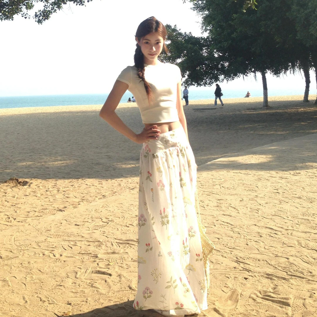 法式绝美白色碎花半身裙子女夏季2025新款小个子海边度假a字长裙