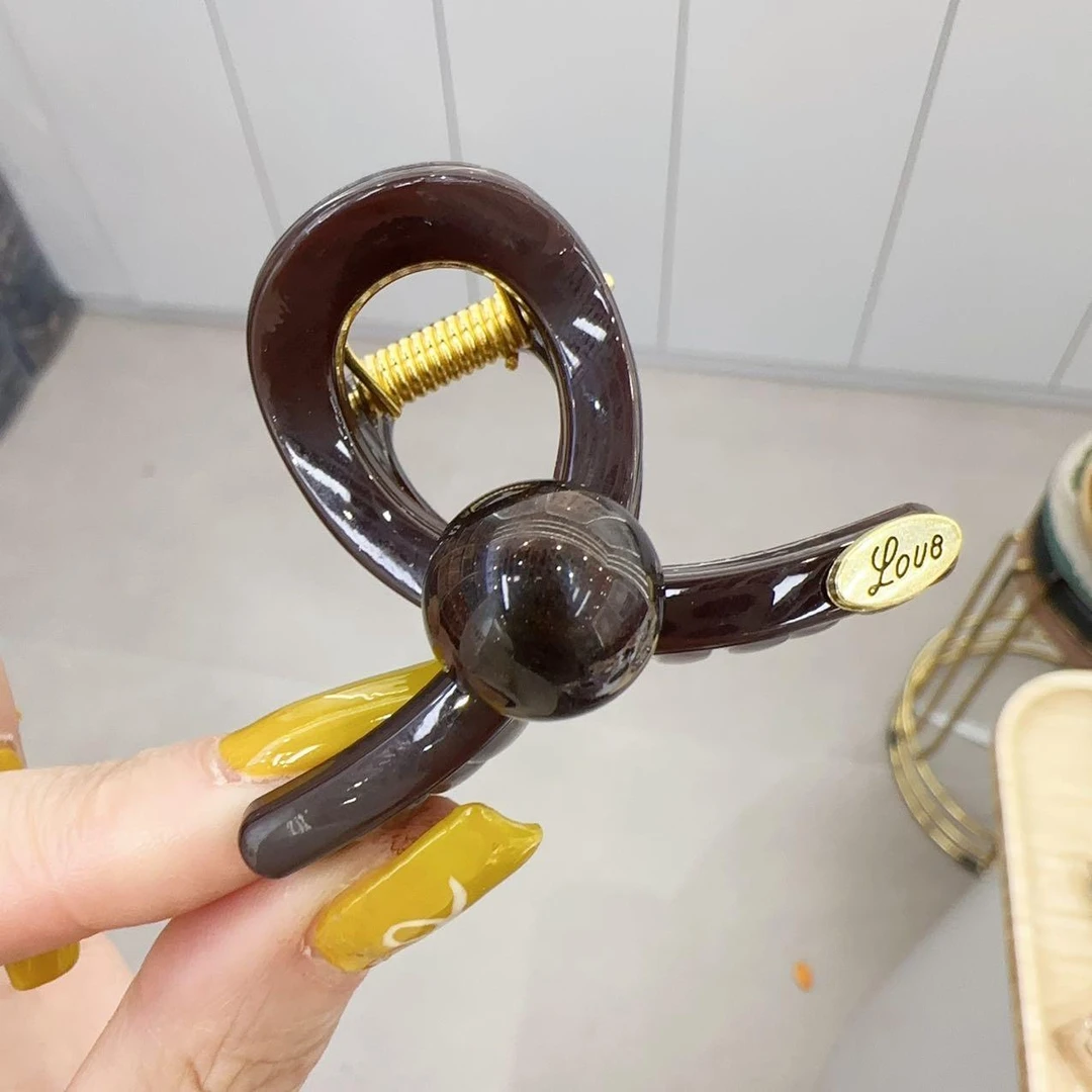 A373高级咖色刘海夹