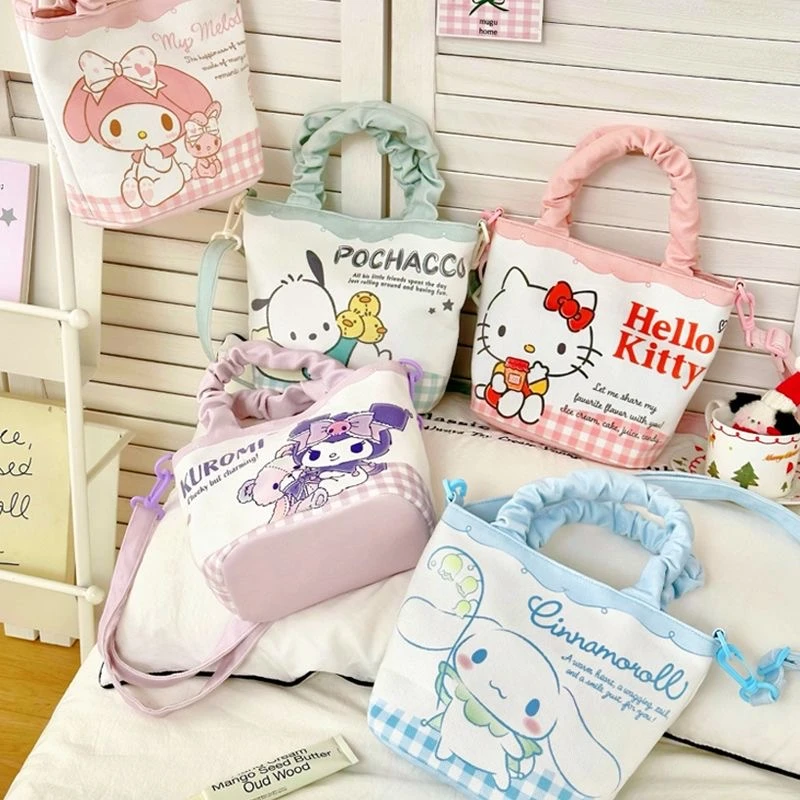 正版三丽鸥Hello kitty美乐蒂酷洛米大耳狗可爱水桶包斜挎手提包