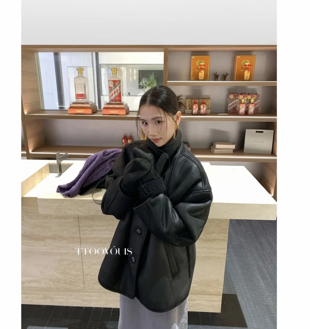 冬季黑色加厚立领皮毛一体时尚百搭外套