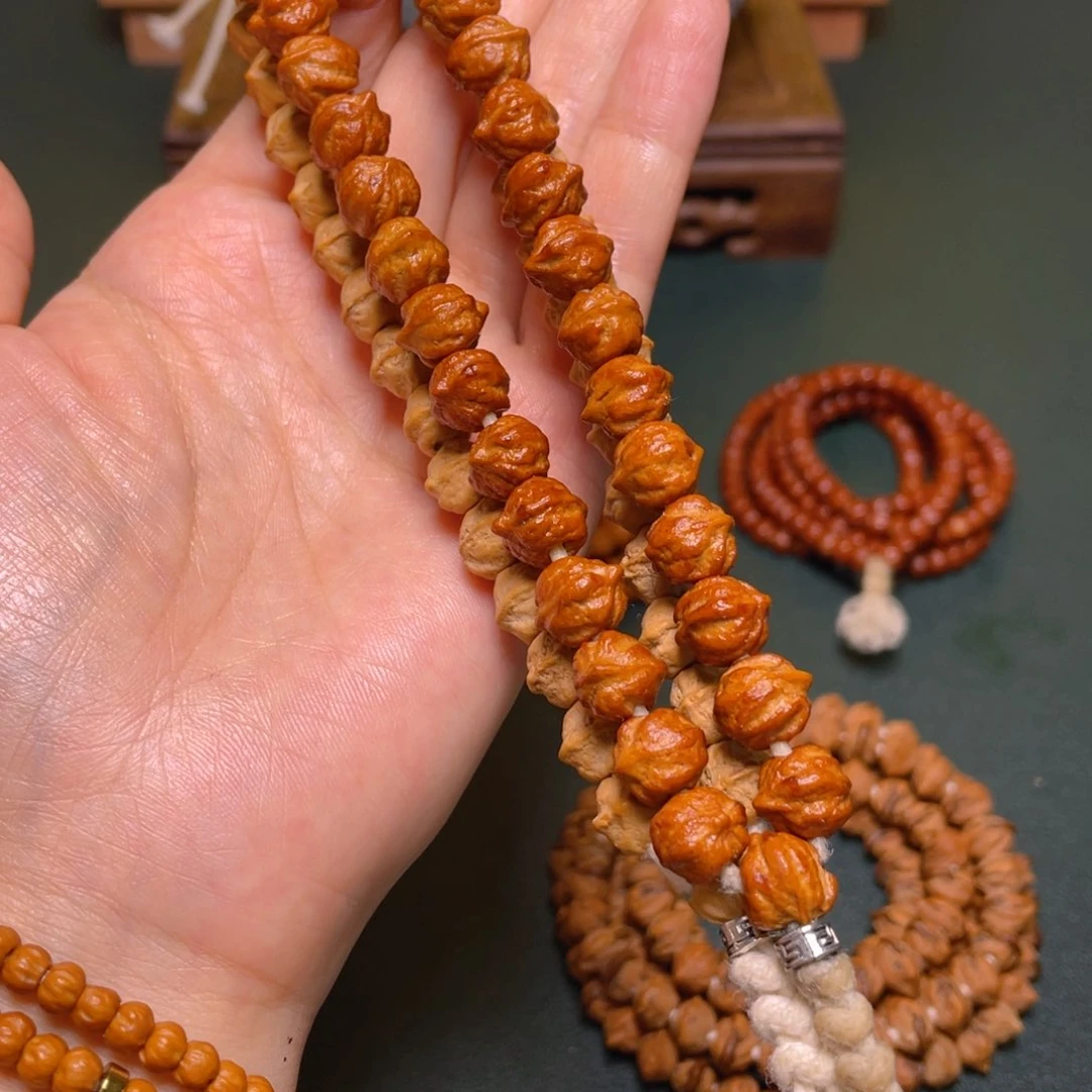 柏香籽/百香籽吊坠白牙横打手持