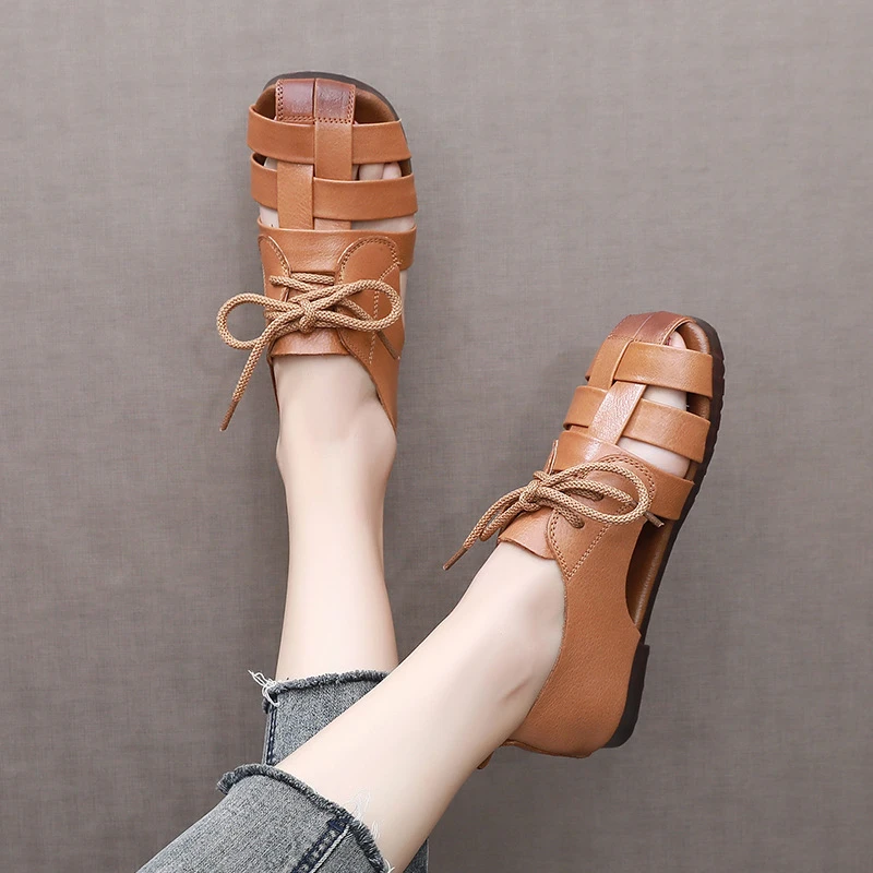 头层真皮软底包头凉鞋女夏季平跟编织罗马猪笼鞋文艺系带休闲女鞋