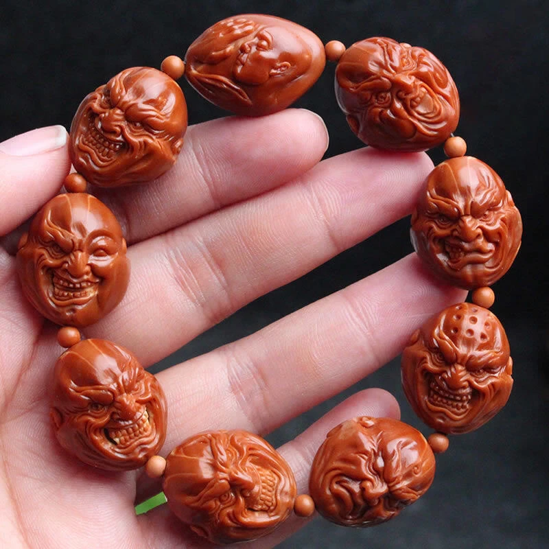 橄榄核雕刻八大恶僧手串油性实足