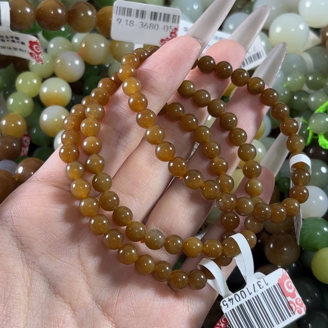 忍***台和田玉未镶嵌手链随机发一