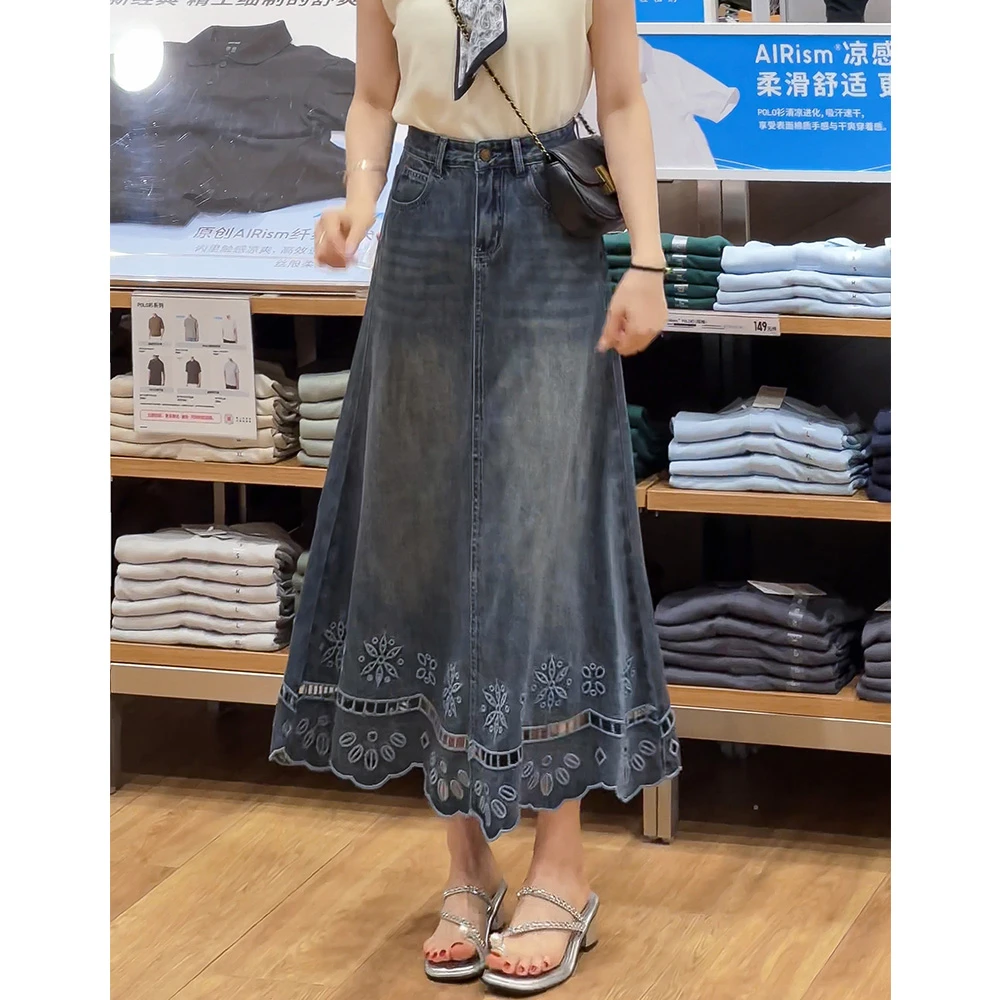 0677欧洲站2025夏季新款设计感镂空花边a字牛仔半身中长裙女