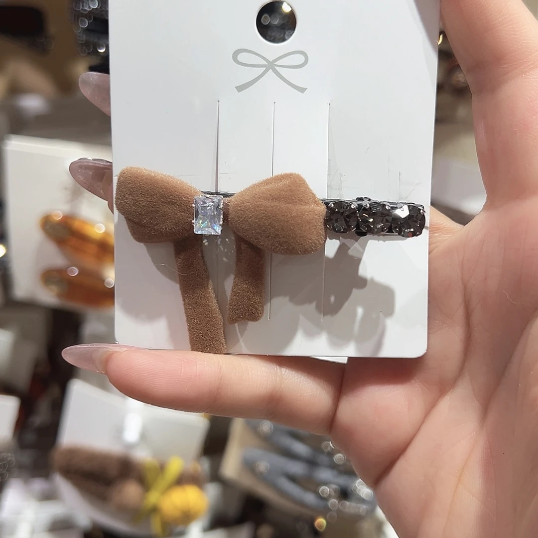 皮质铁合金咖色蝴蝶结鸭夹