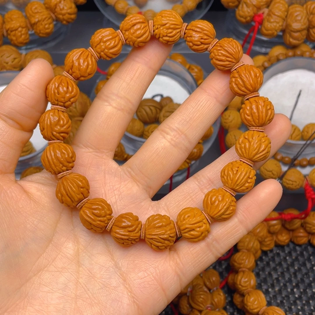 桃核吊坠1.4金蝉纹