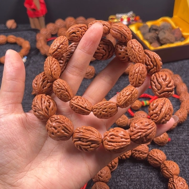 凌***子桃核吊坠桃枭手串L9