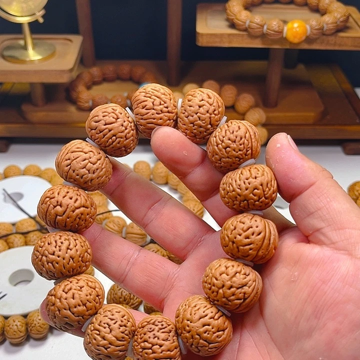 清***间桃核吊坠蓦然桃呵呵