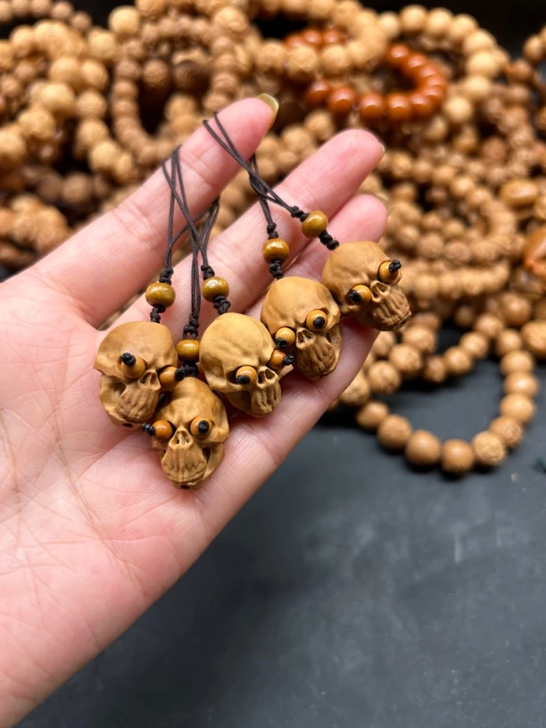 橄榄核雕刻骷髅头路路通避鬼单粒钥匙扣手机挂件吊坠