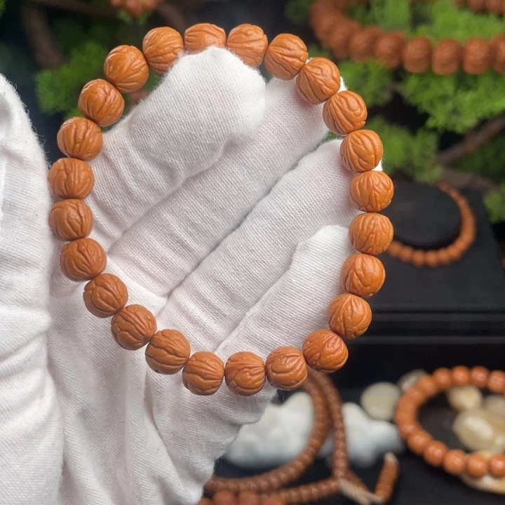 L***磊桃核吊坠玉龙脊单圈