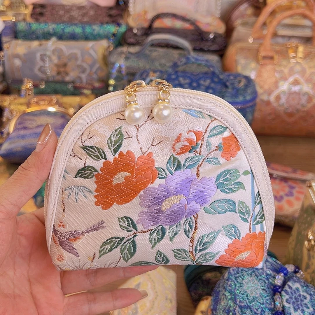 蚕丝花卉达贝壳包