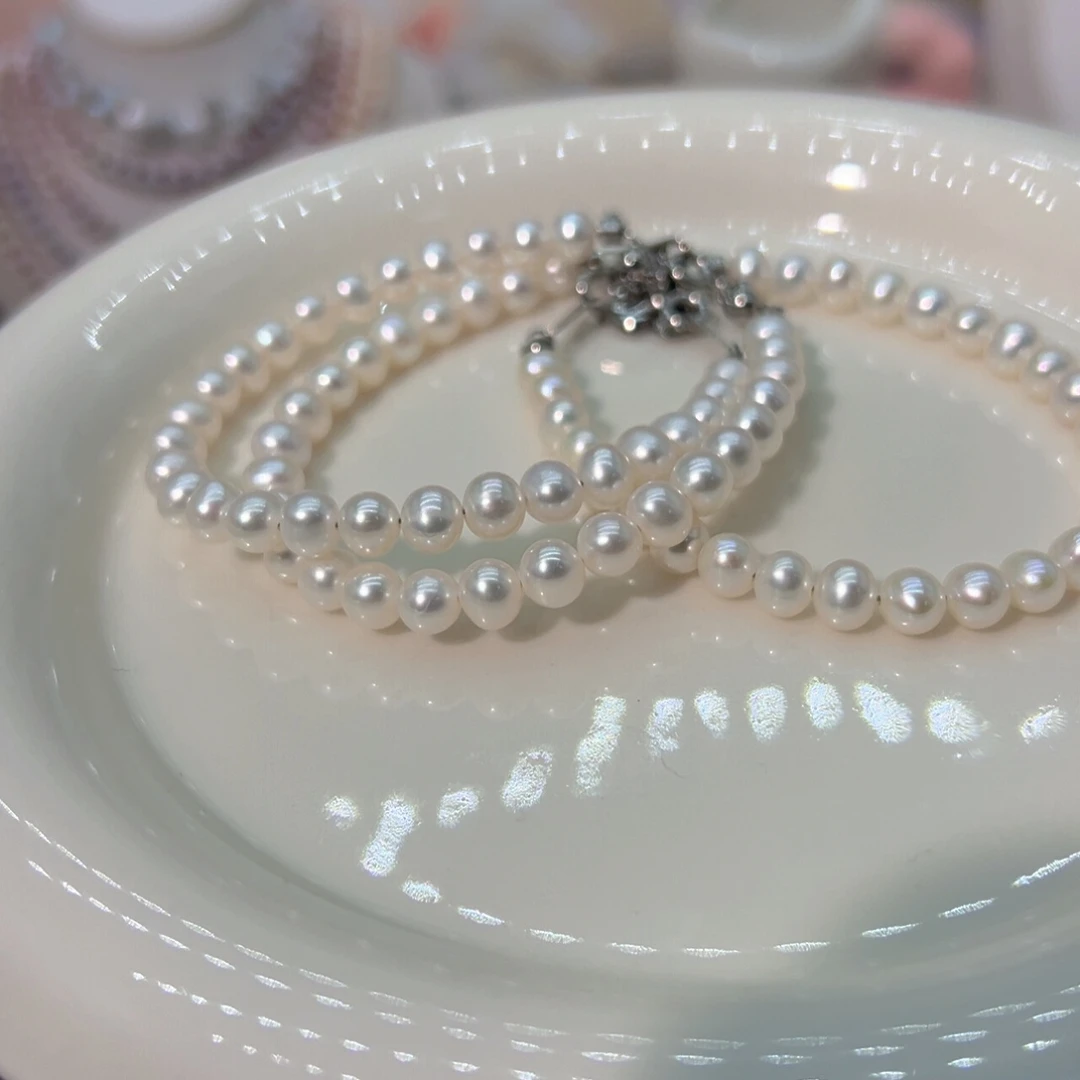 淡水珍珠钛钢5.5左右近圆极光天然珍珠