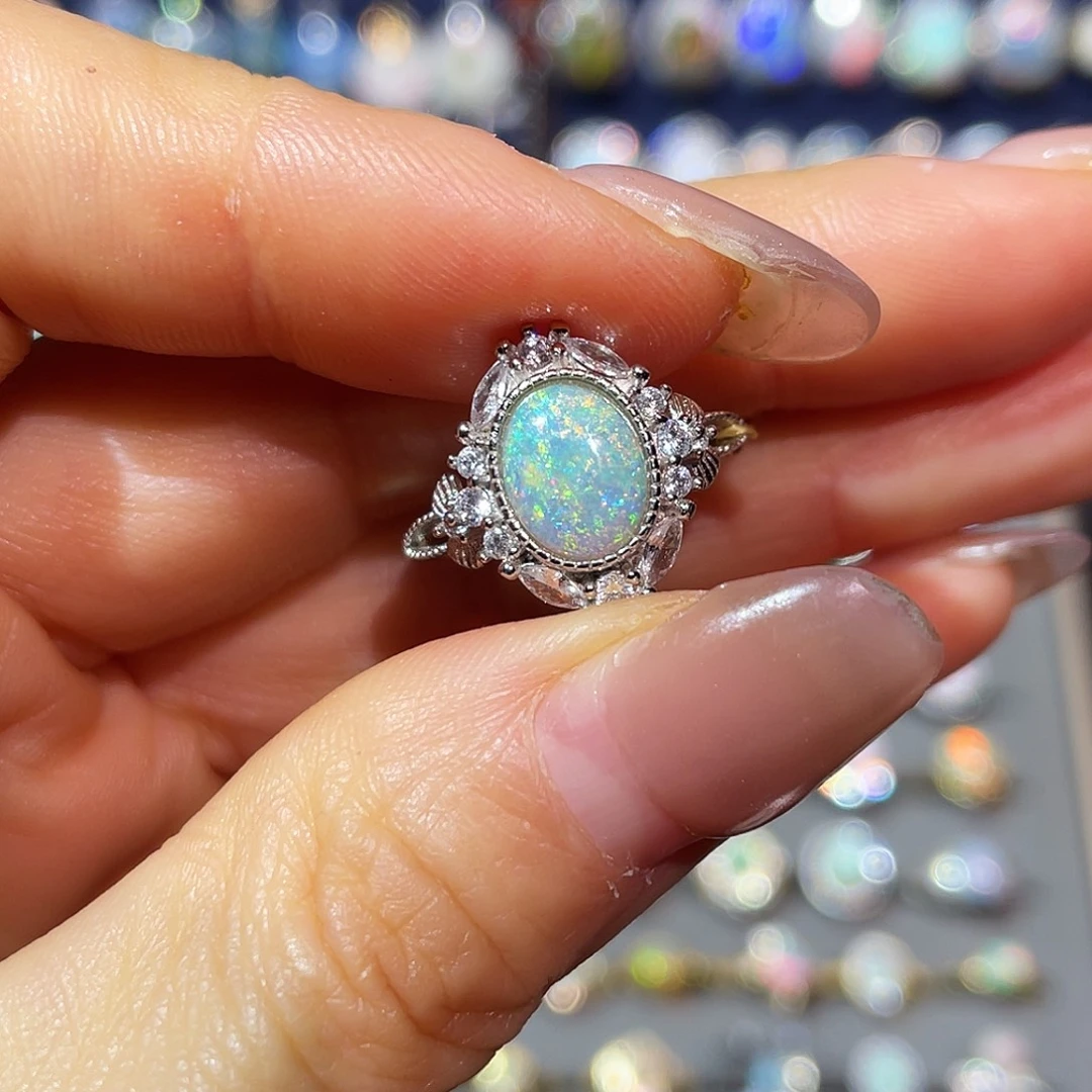 莫***离欧泊银S925镶嵌戒指