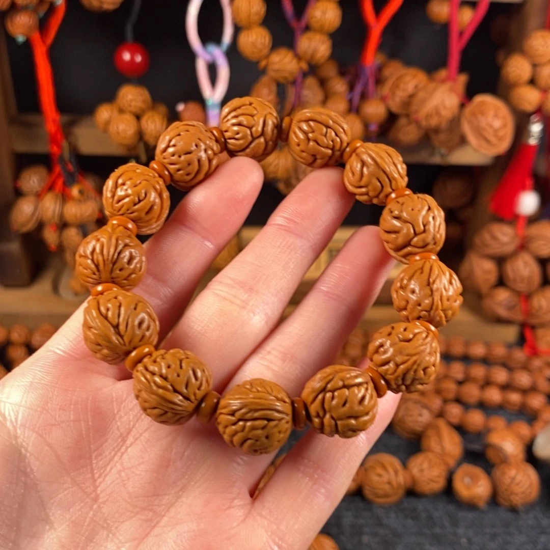 吊坠桃核9链接桃枭手串