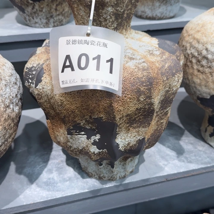 陈****瓷片景德镇高温花器编码011高31口6默认无孔