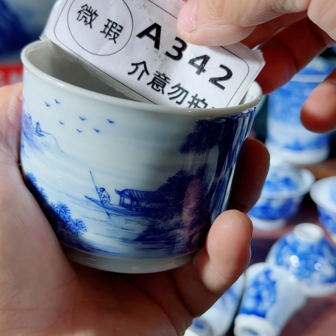 杯子李*熹手工手绘的陶瓷，