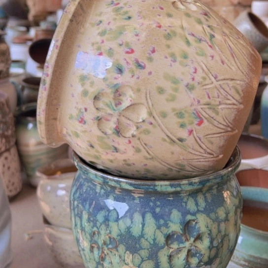 紫砂花盆高20口29。