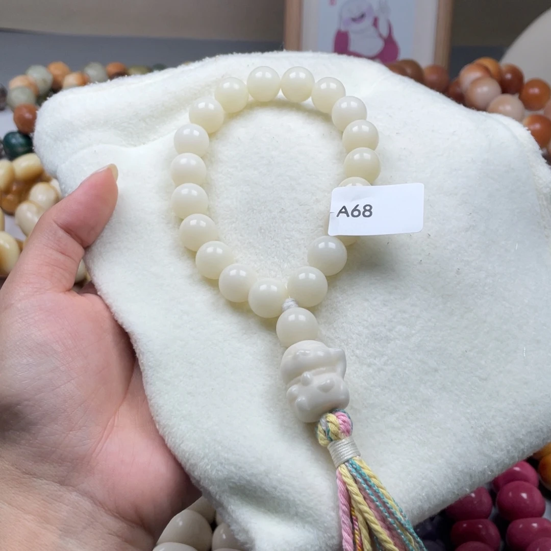 吊坠菩提根/象牙果A68圆珠手持13mm一串通货随机
