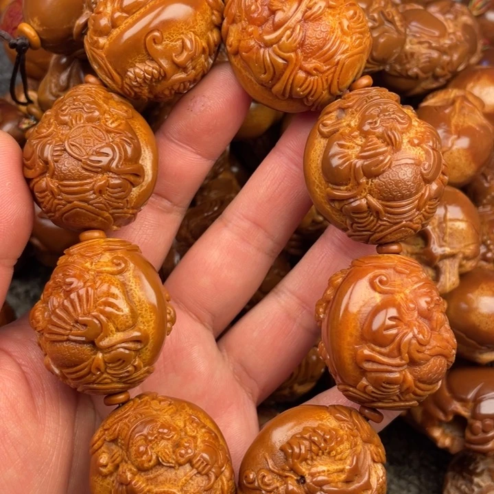 橄榄核吊坠周**界橄榄核手持