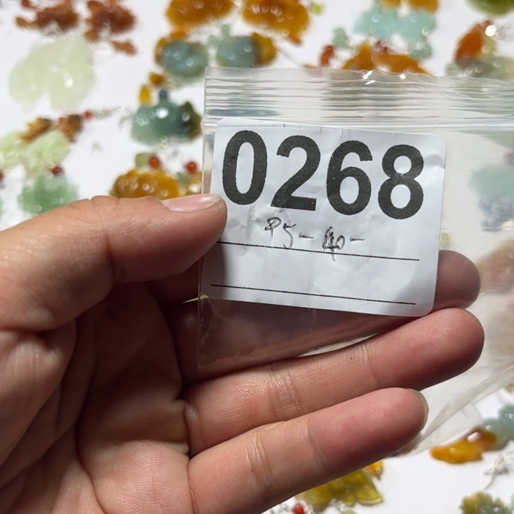 浴***生合金蛇纹石玉耳饰