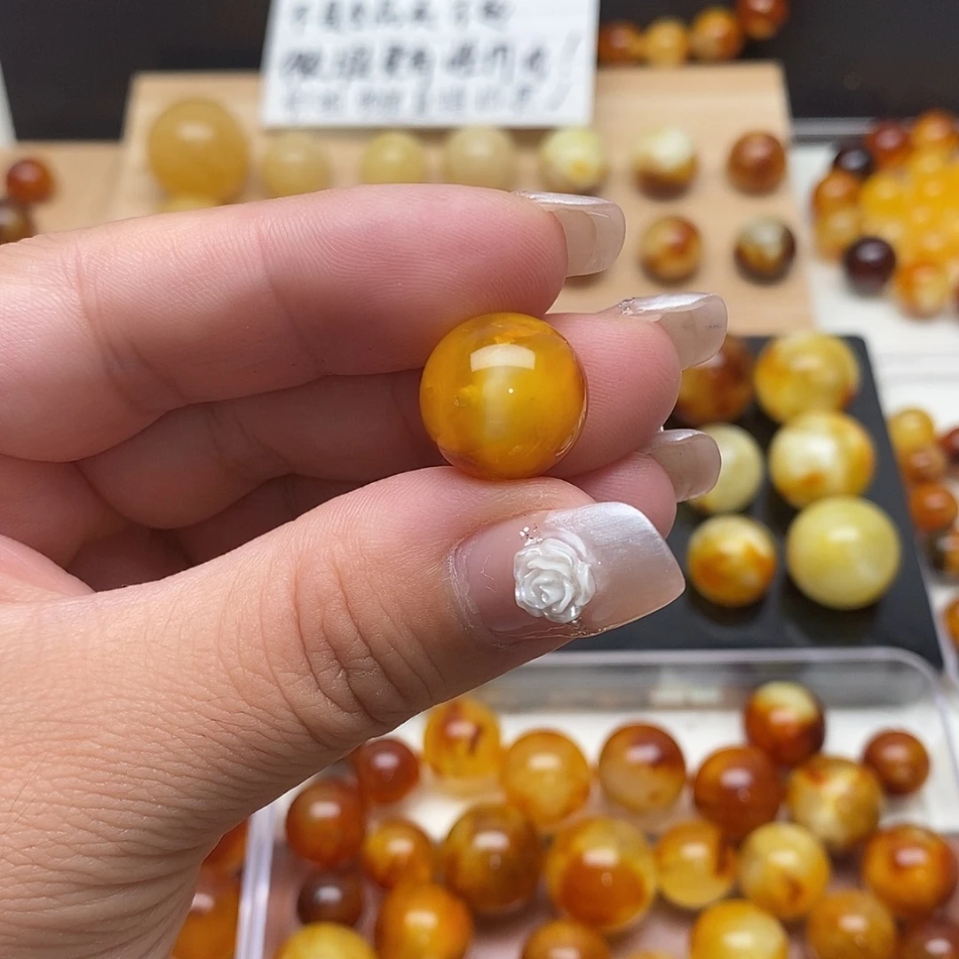 郑***瑶裸石虫珀未镶嵌蜜蜡