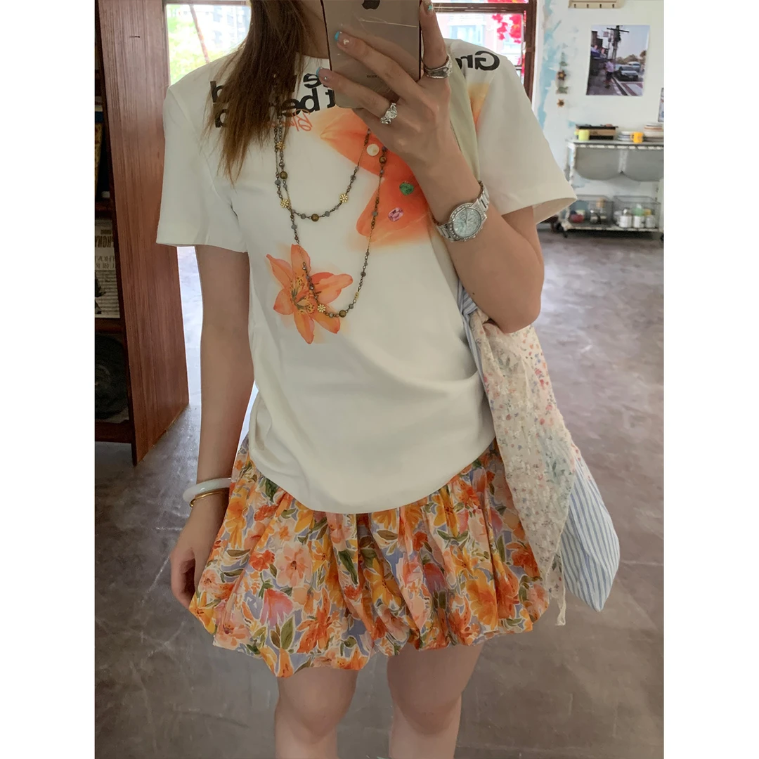 木子羊 橘花南瓜裙2025夏季新款显瘦小众甜美设计少女a字半身短裙