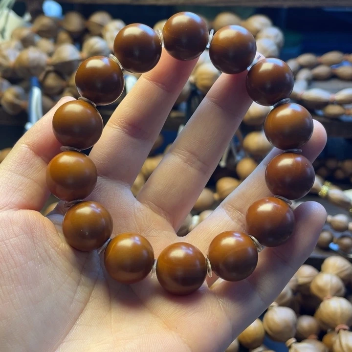 嘻***哈橄榄核手串/手链正圆光珠16
