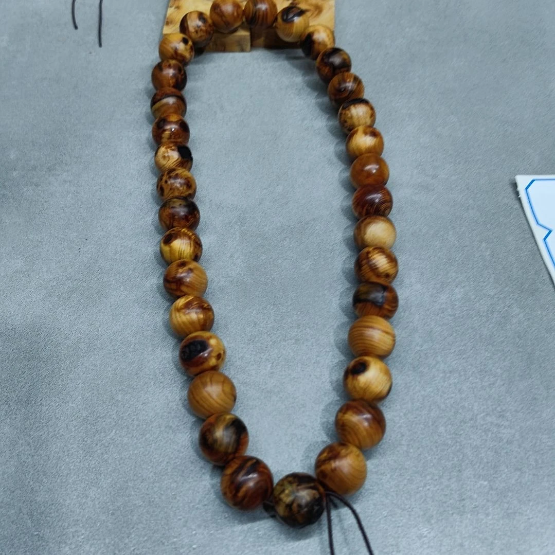 二***宝1.5碳化瑕疵手持一个。。。。