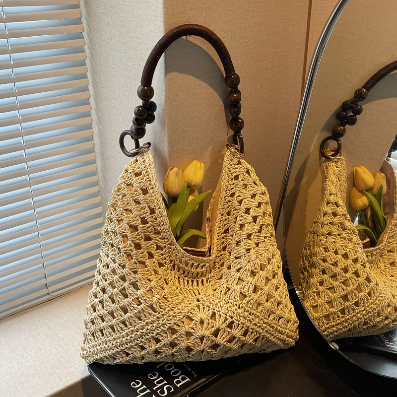 新中式编织包女2025新款海边度假沙滩包串珠单肩草编包百搭托特包