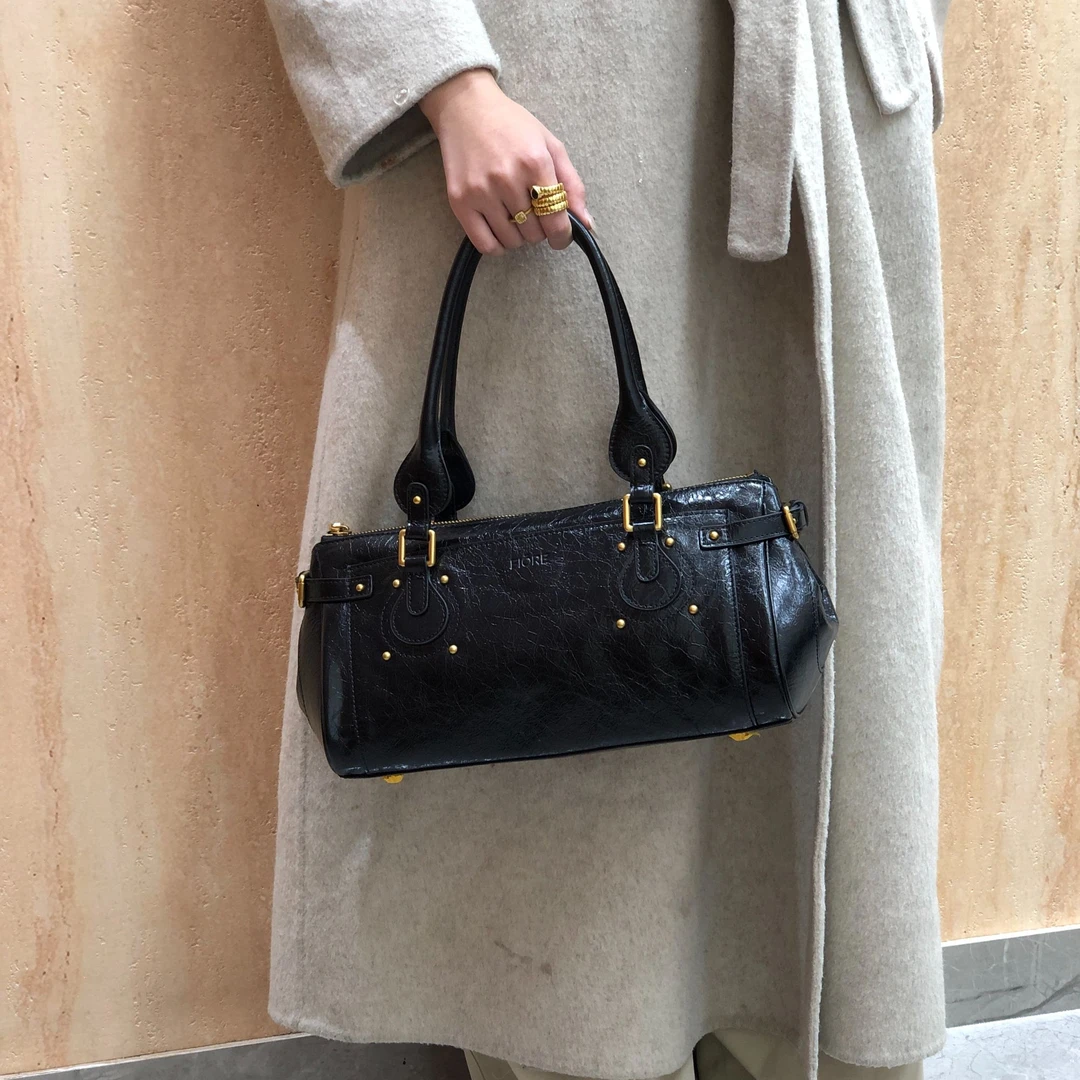 2025小众设计师款头层爆裂油蜡牛皮手提保龄球包