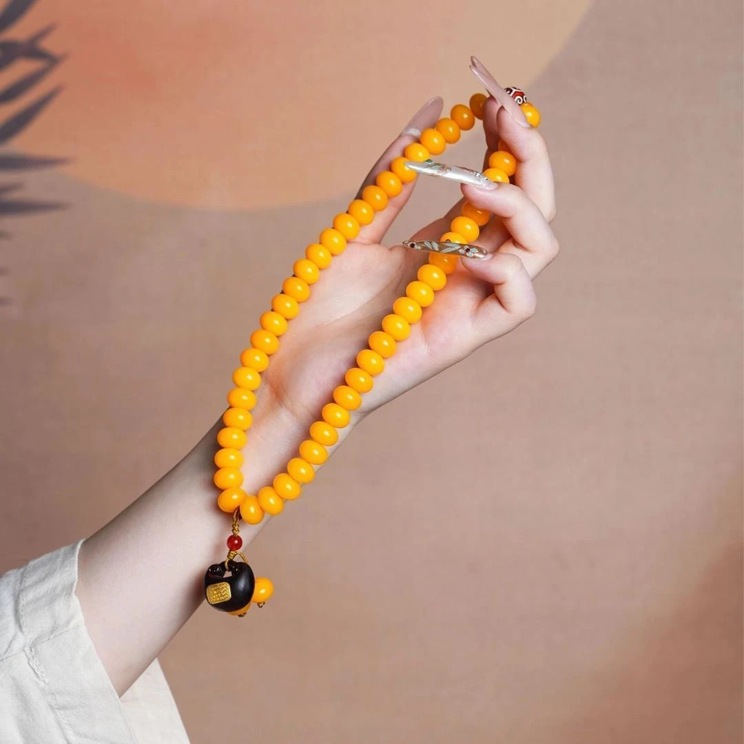 A526-黄玉双圈菩提+进宝挂坠8*10mm