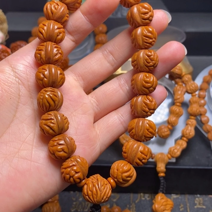 左****手串桃核凤羽金蟾手持15