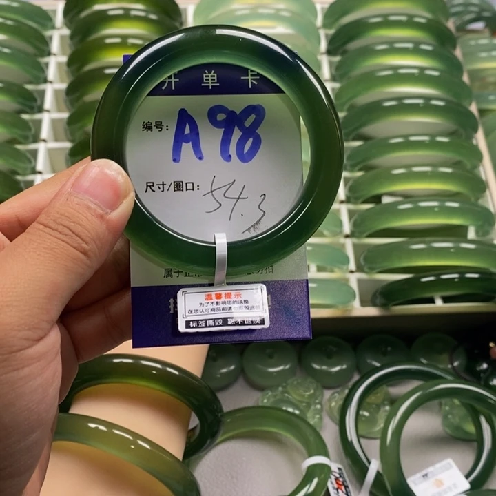 紫***壳未镶嵌蛇纹石玉手镯