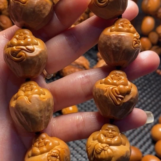 橄榄核吊坠墨*池包衣弥勒