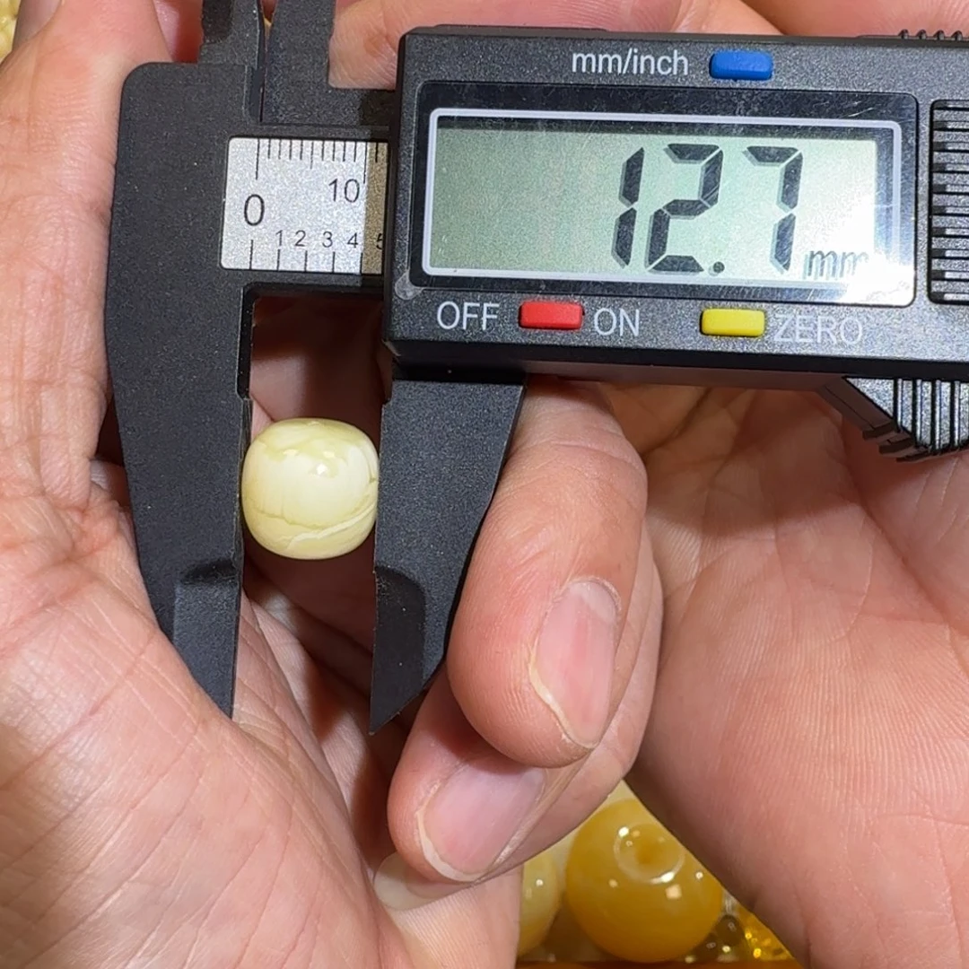 光***孙琥珀未镶嵌珠宝奇石12.7X12.4m老型单珠1.23