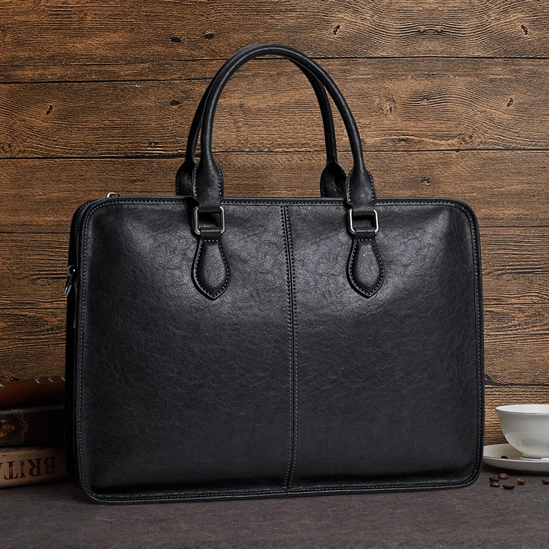 英皇保罗男士商务复古植鞣真皮公文包电脑包斜挎包质感肩包男包