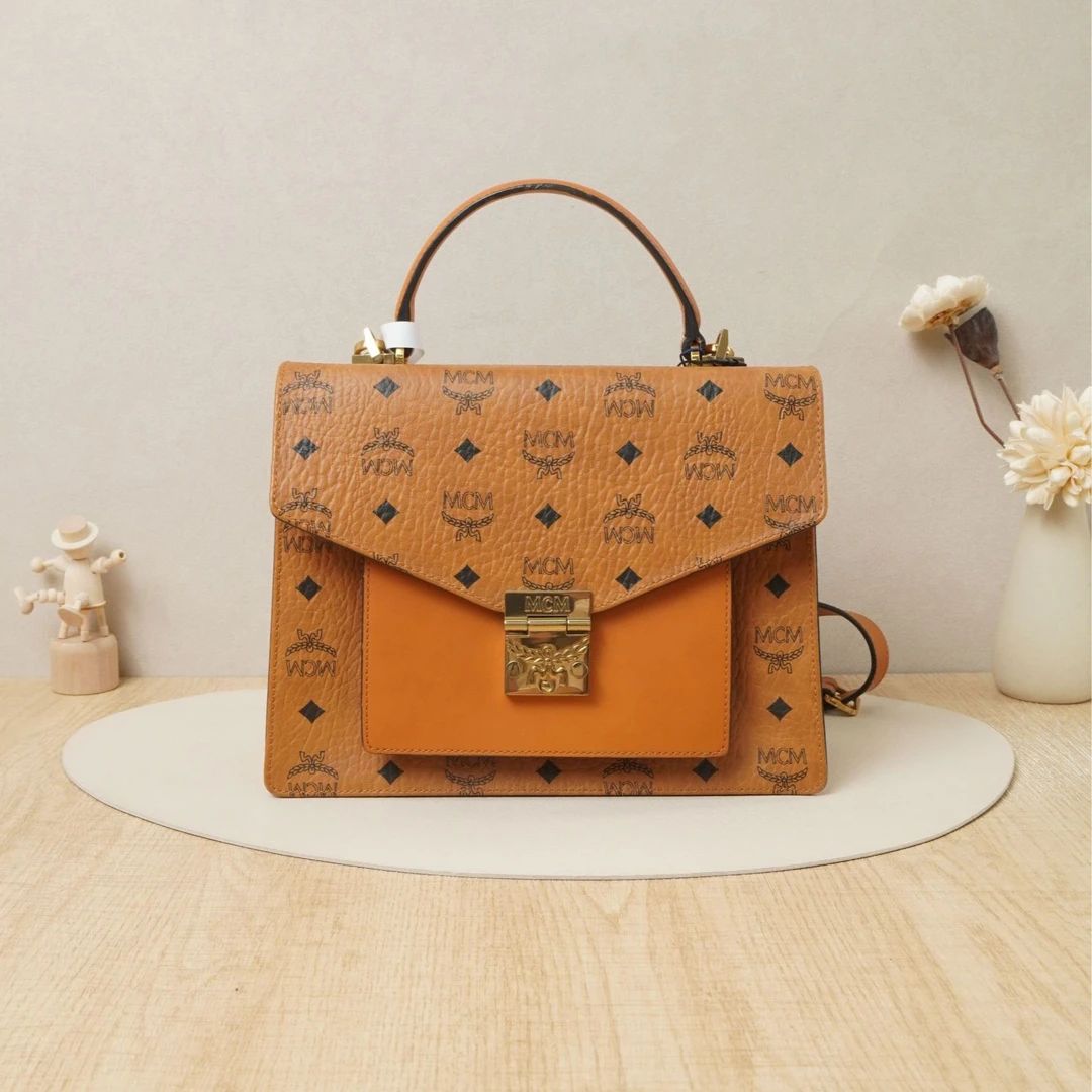 95新 MCM  MCM手提邮差包干邑色/DS042238