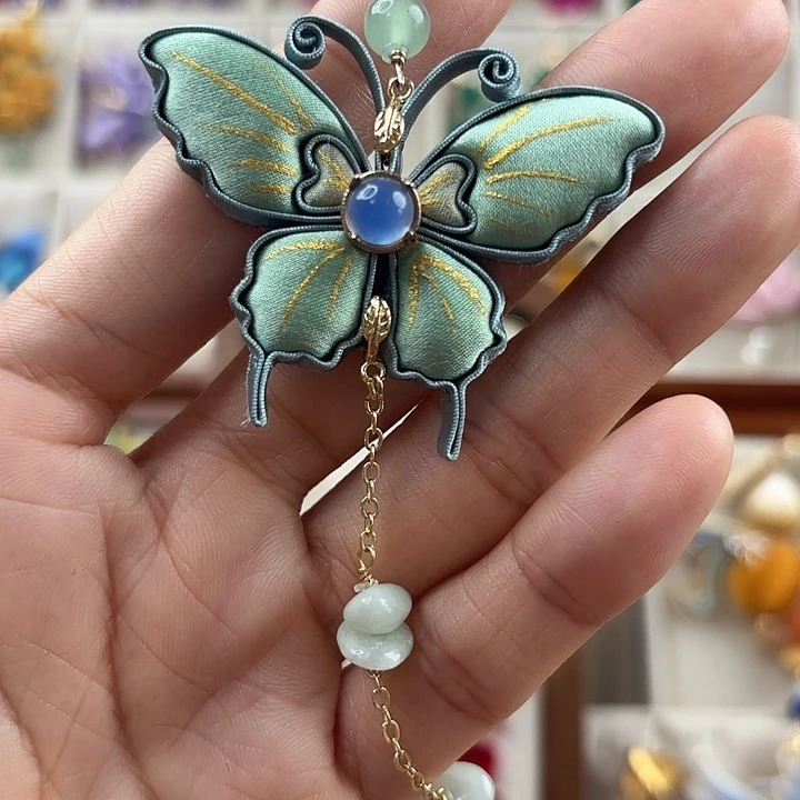 芳***ᓗ薄荷绿蝴蝶压襟手工编织