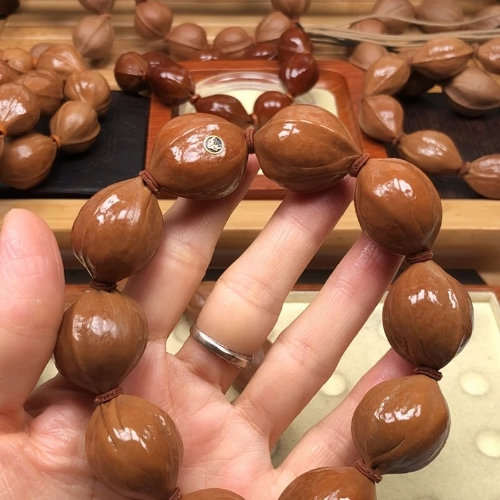手串橄榄核梅林铁核22 X28带金银标精品