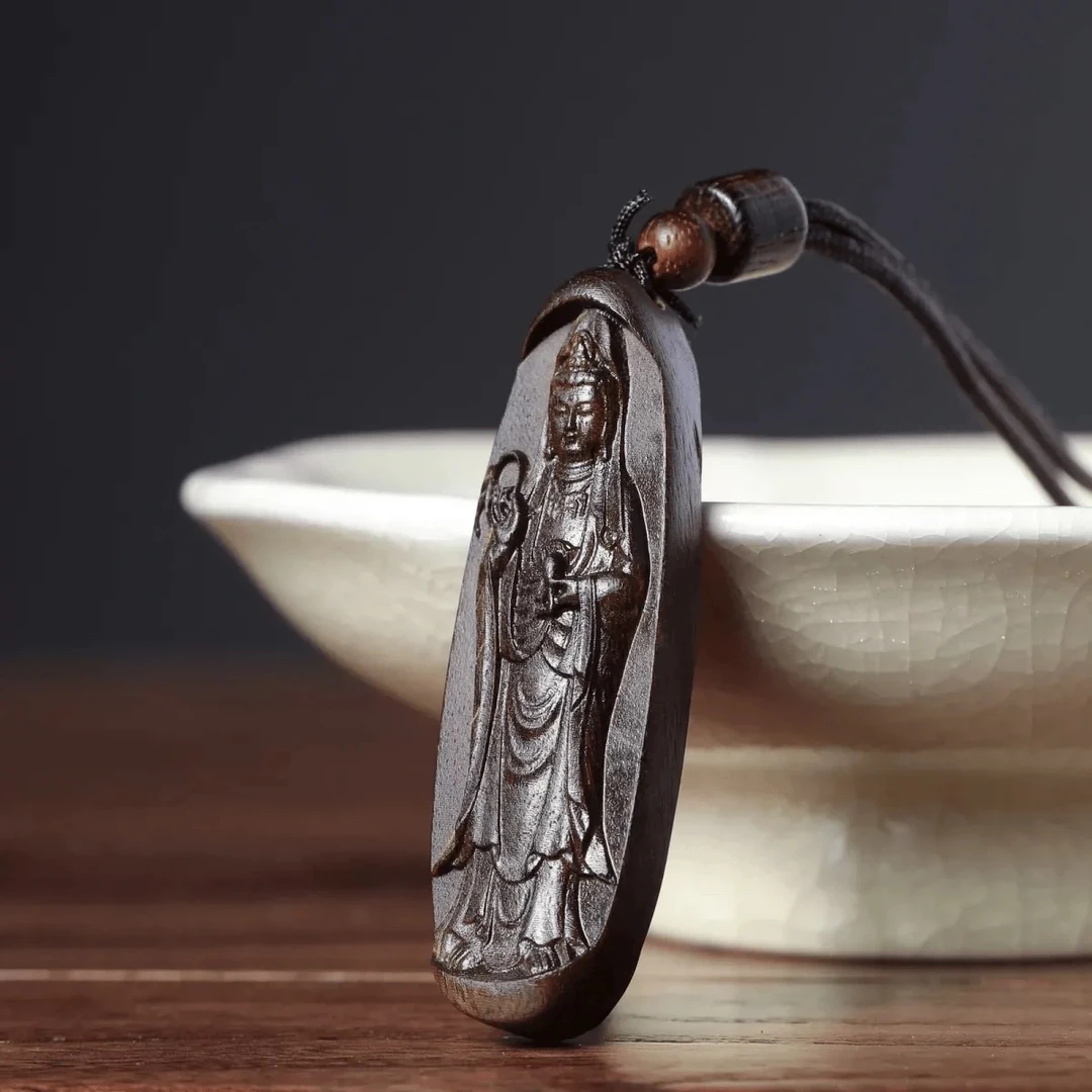 《观音挂件圆款》6/2cm 巴布亚贡木天然复古原木雕刻文玩脖挂件